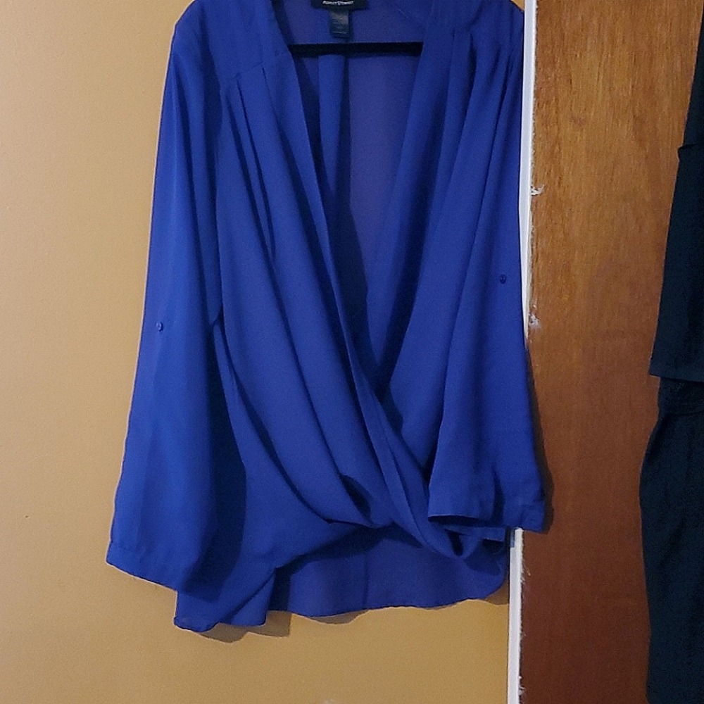 Purple/ grape colored blouse